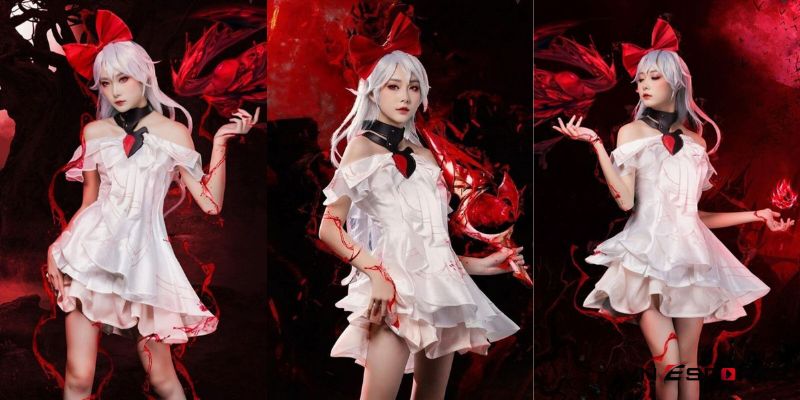 Nữ coser xinh đẹp trong bộ váy trắng